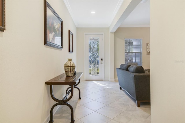 tiled entryway with ornamental molding