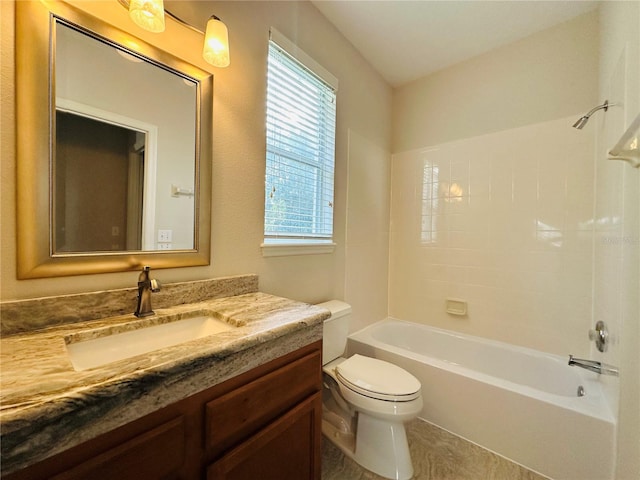 full bathroom featuring vanity, tub / shower combination, and toilet