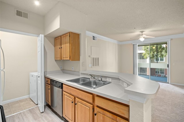 kitchen with stainless steel dishwasher, a textured ceiling, ceiling fan, sink, and light hardwood / wood-style floors