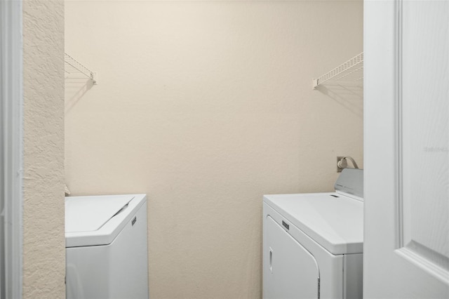 laundry area with washer and dryer