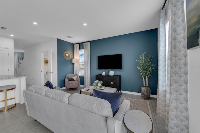 living room featuring light tile patterned floors