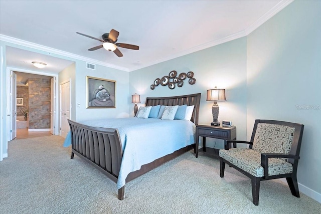 carpeted bedroom featuring connected bathroom, ceiling fan, and crown molding