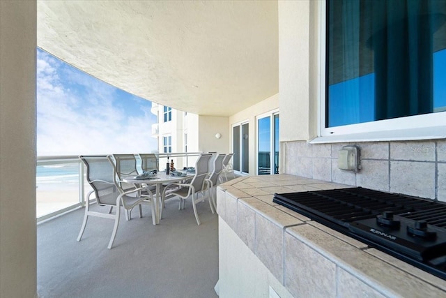 view of patio with a water view