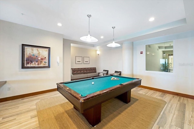 rec room with light hardwood / wood-style floors and billiards