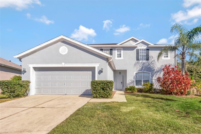 view of front property with a front yard and a garage