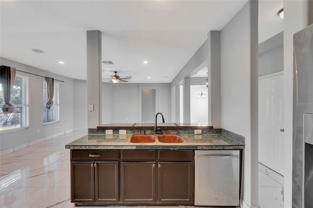 kitchen with dishwasher, dark brown cabinets, ceiling fan, and sink