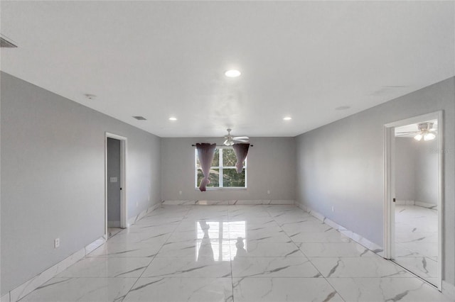 unfurnished room featuring ceiling fan