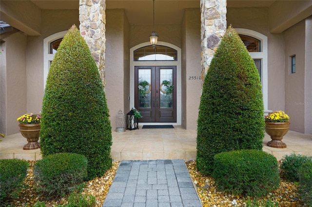 doorway to property featuring french doors