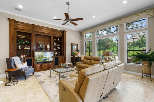 tiled living room featuring ceiling fan and crown molding