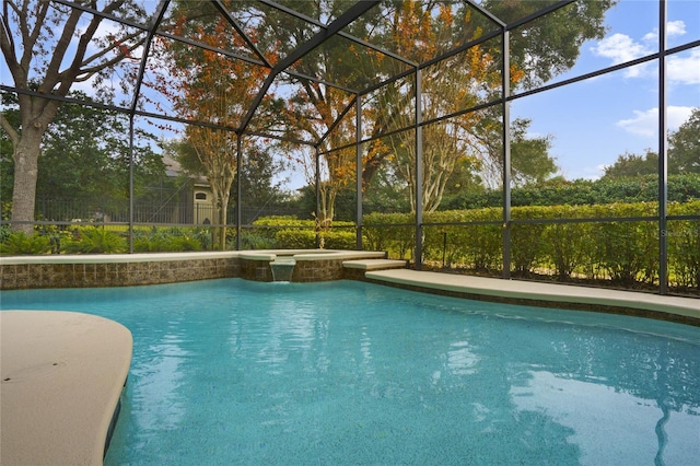 view of pool featuring a lanai