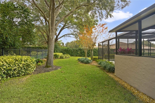 view of yard with a lanai