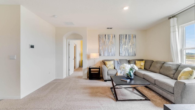 living room with light carpet