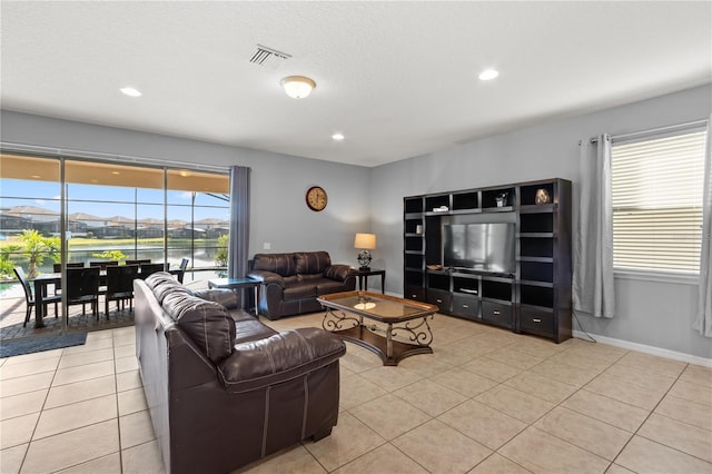 living room featuring light tile patterned floors