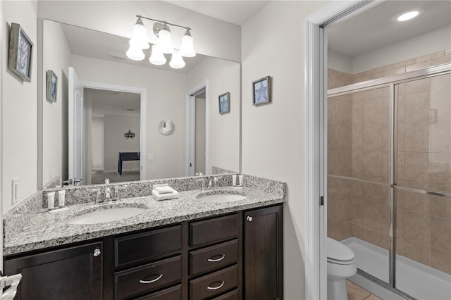 bathroom with walk in shower, tile patterned floors, a chandelier, toilet, and vanity