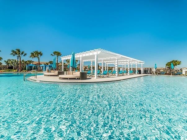 view of swimming pool featuring a patio area and a pergola