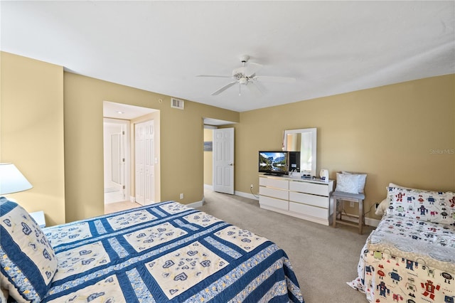 bedroom featuring light carpet, a closet, and ceiling fan