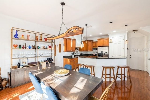 dining room featuring light wood-type flooring