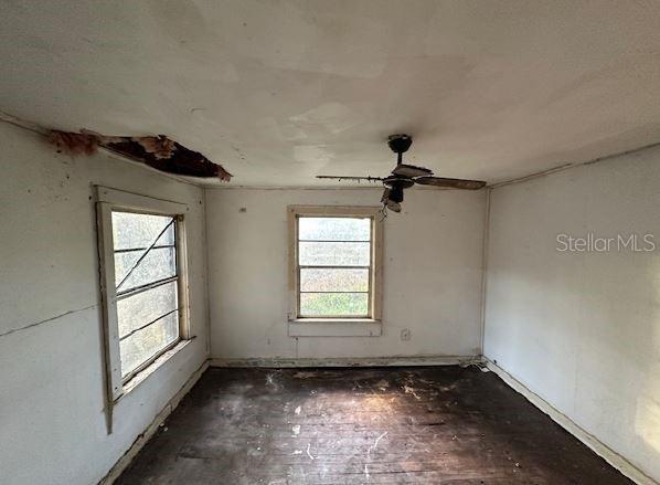 unfurnished room featuring ceiling fan