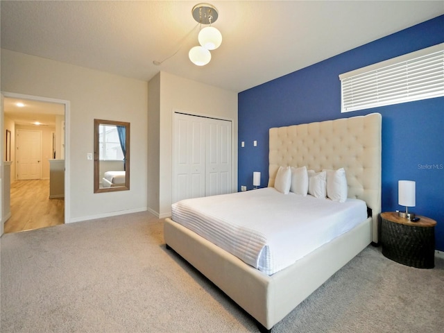 bedroom with a closet and carpet floors