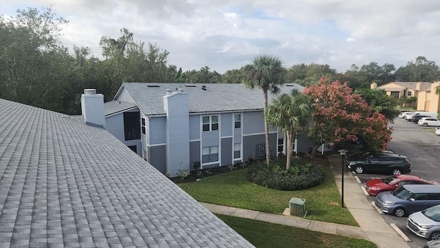 exterior space with a front lawn