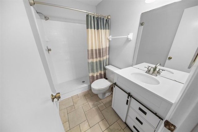 bathroom featuring a shower with shower curtain, vanity, and toilet