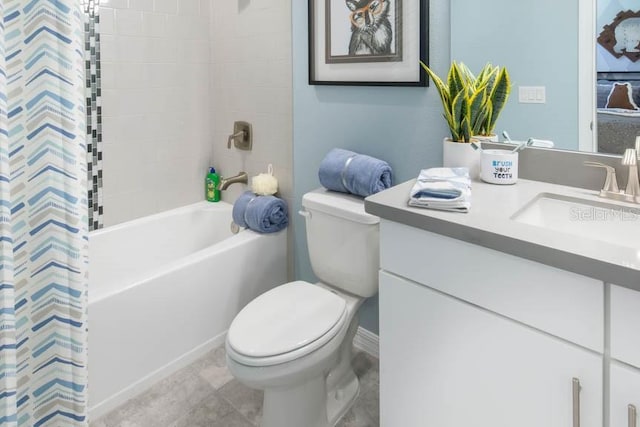 full bathroom featuring tile patterned flooring, shower / bath combination with curtain, vanity, and toilet