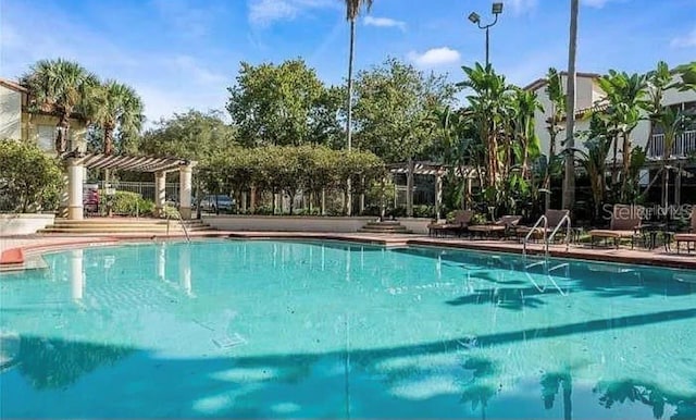 view of pool with a pergola