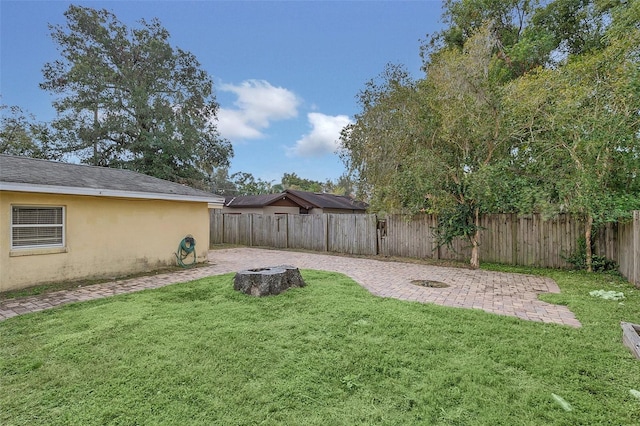 view of yard with a patio area