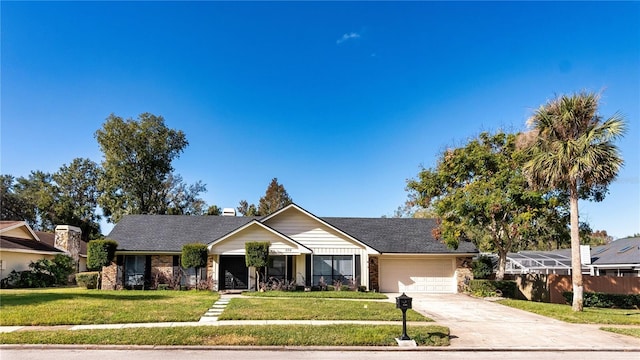 ranch-style house with a garage and a front yard