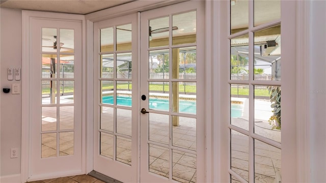 doorway featuring plenty of natural light and french doors