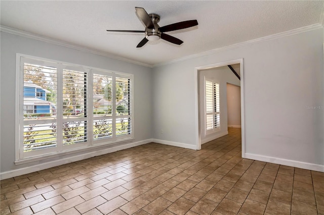 empty room featuring a textured ceiling, a wealth of natural light, ornamental molding, and ceiling fan