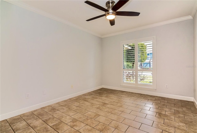 spare room with ceiling fan and crown molding