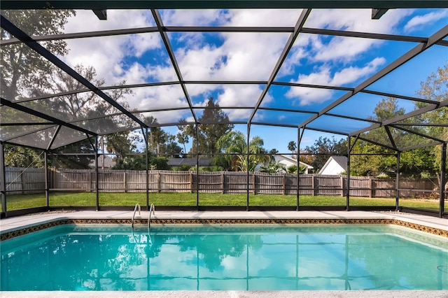 view of pool with a lanai