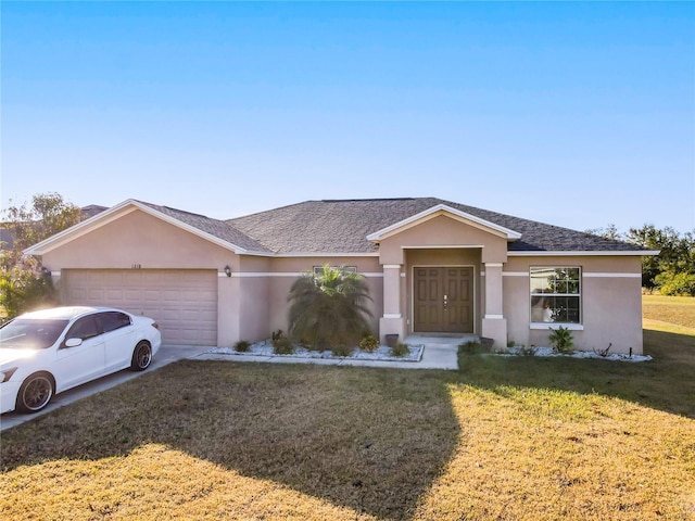 ranch-style house featuring a garage and a front yard