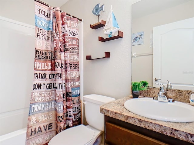 full bathroom featuring vanity, toilet, and shower / tub combo with curtain