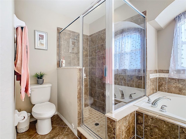 bathroom with tile patterned floors, toilet, and shower with separate bathtub