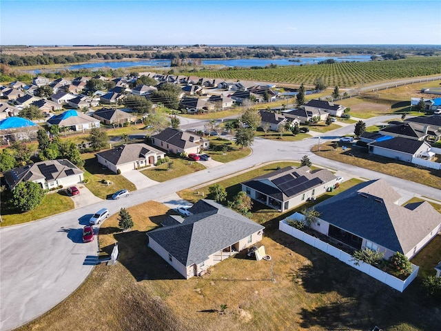 drone / aerial view with a rural view and a water view