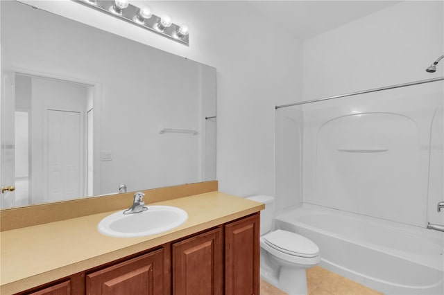 full bathroom featuring tile patterned floors, vanity, toilet, and shower / bath combination