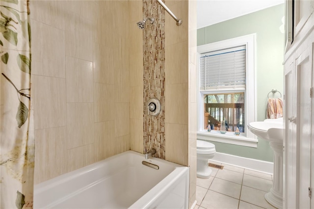 bathroom with tile patterned flooring, shower / bath combination with curtain, and toilet