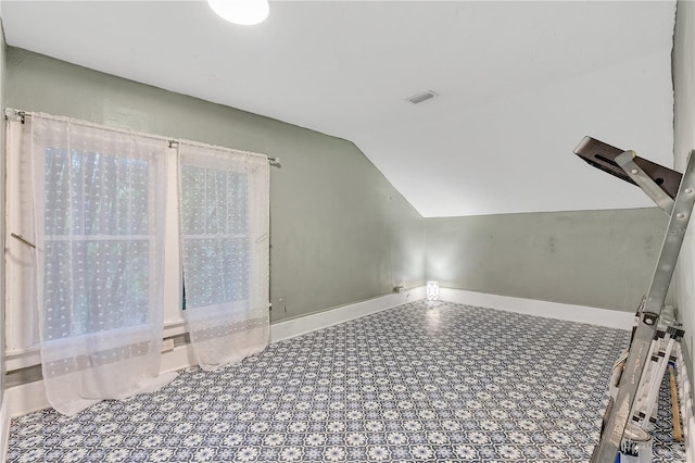 bonus room featuring lofted ceiling