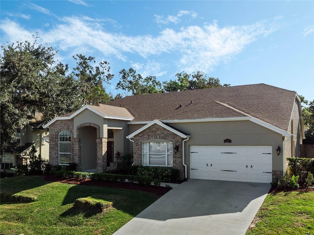 ranch-style house with a garage and a front yard