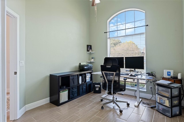 office with light wood-type flooring