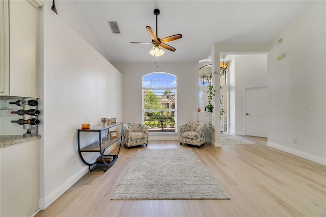 2226 Lake Marion Dr, Apopka, FL 32712 - living area featuring baseboards, light wood-type flooring, and visible vents
