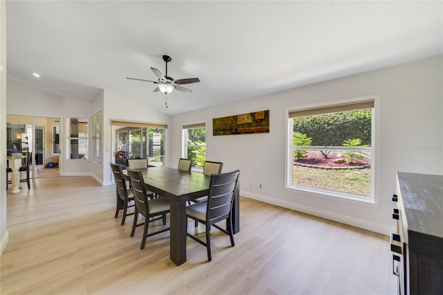 2226 Lake Marion Dr, Apopka, FL 32712 - dining room with a ceiling fan, baseboards, vaulted ceiling, and light wood-style flooring