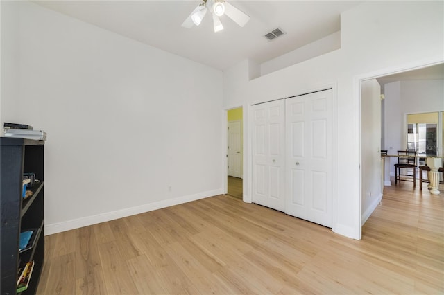 2226 Lake Marion Dr, Apopka, FL 32712 - unfurnished bedroom with a closet, baseboards, visible vents, and light wood-type flooring