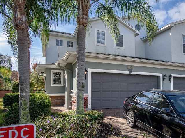 view of front of property featuring a garage