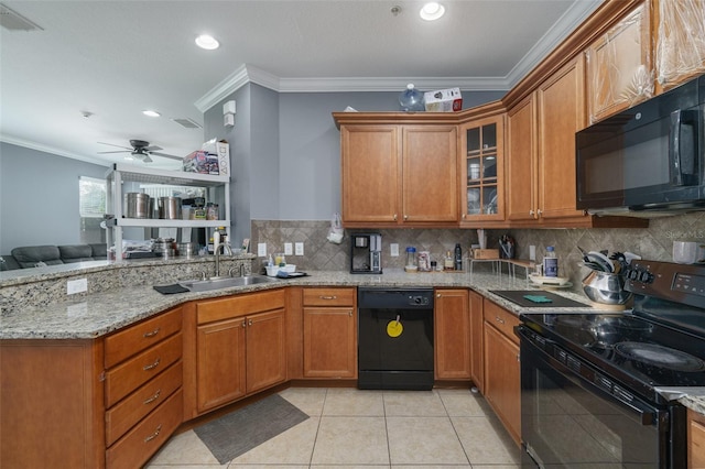 kitchen with ceiling fan, sink, black appliances, and ornamental molding