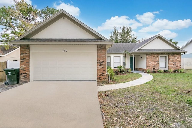 single story home featuring a garage