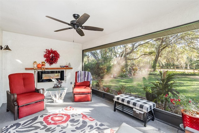 sunroom / solarium with ceiling fan