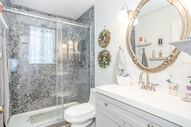 bathroom with vanity, toilet, and an enclosed shower